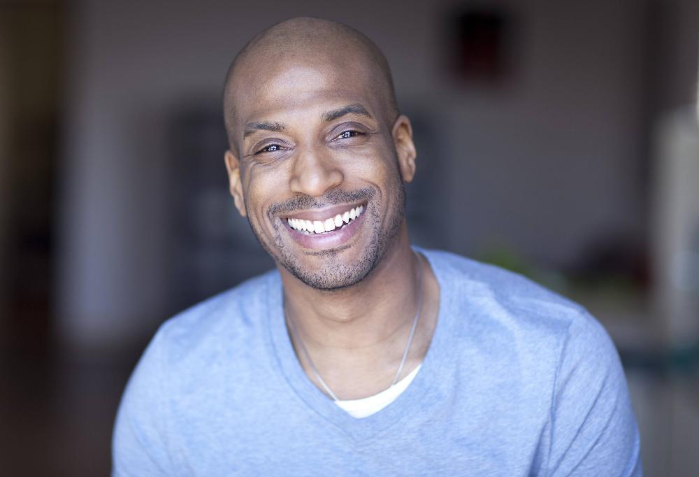 man smiling after visiting West Allis dental office