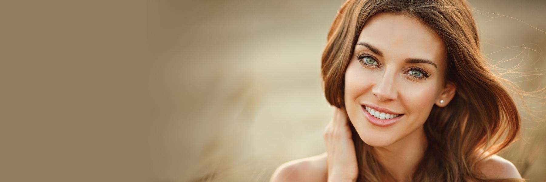 A woman after TMJ treatment in Wisconsin smiles, Milwaukee