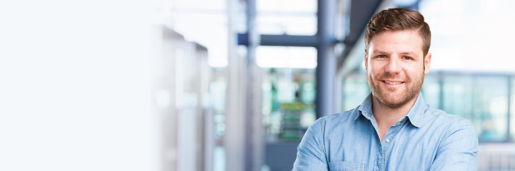 man standing in outside of office
