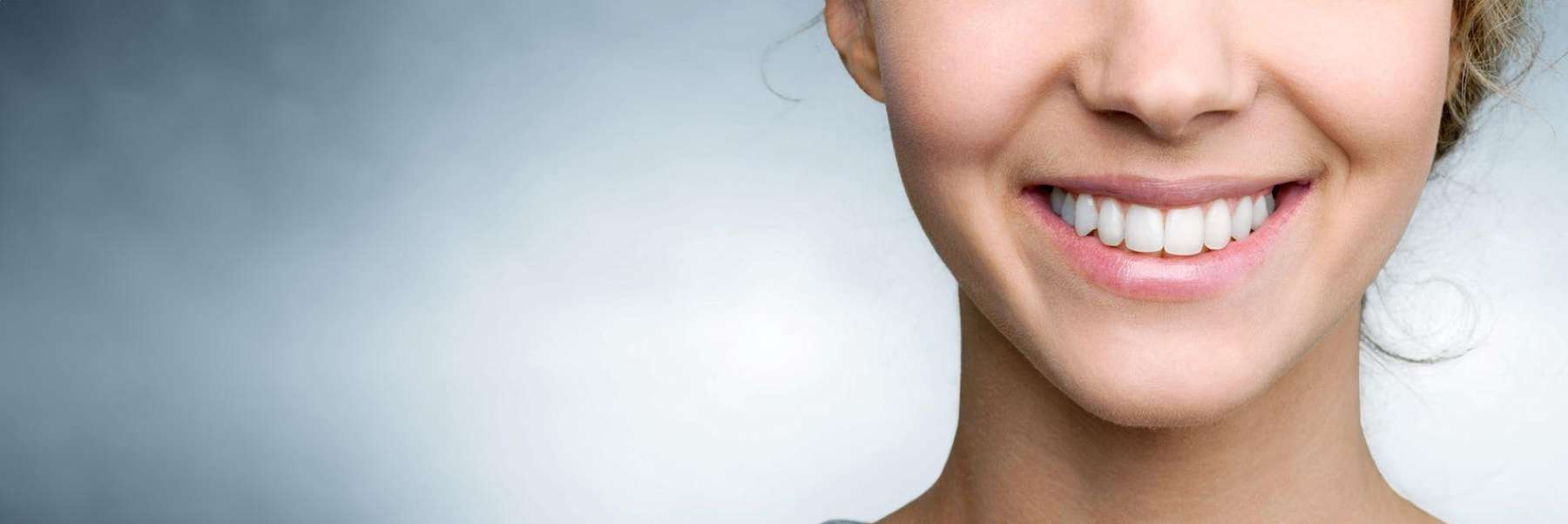 A lady smiling after teeth whitening at Wisconsin smile, Milwaukee