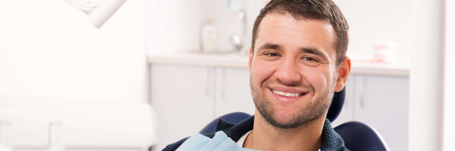 A gentleman smiling after TMJ Treatment in West Allis, WI.