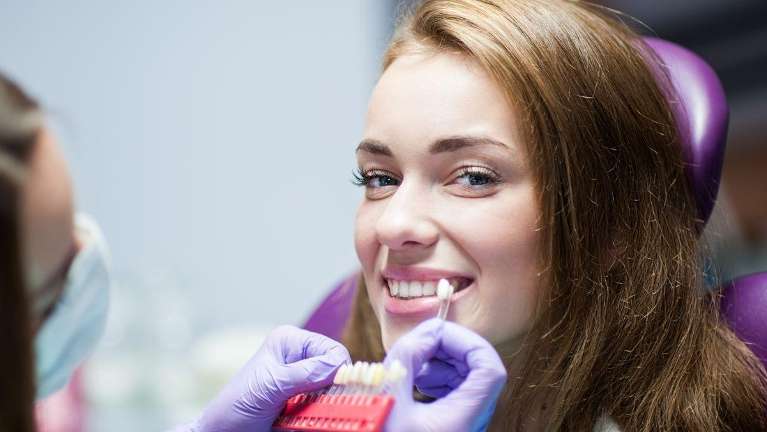 A lady undergoing whitening at Wisconsin smile, Milwaukee