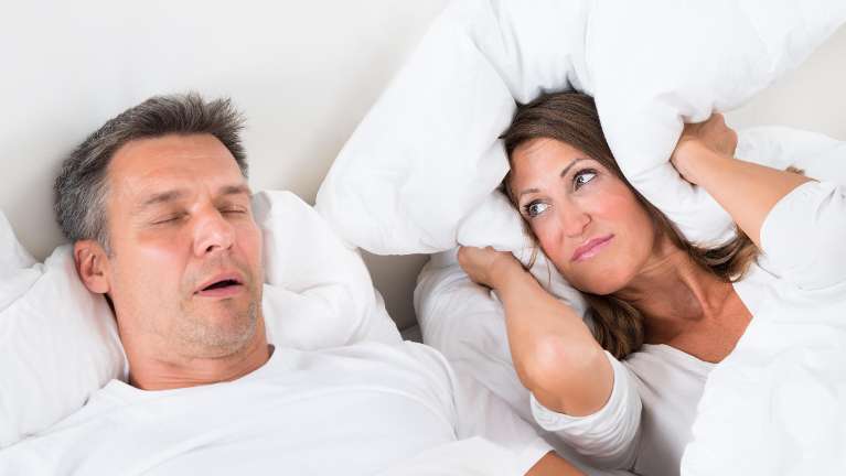 A couple sleeping after sleep Apnea Treatment in West Allis, WI.