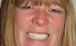 Woman smiling after having teeth whitened | Dentist West Allis WI