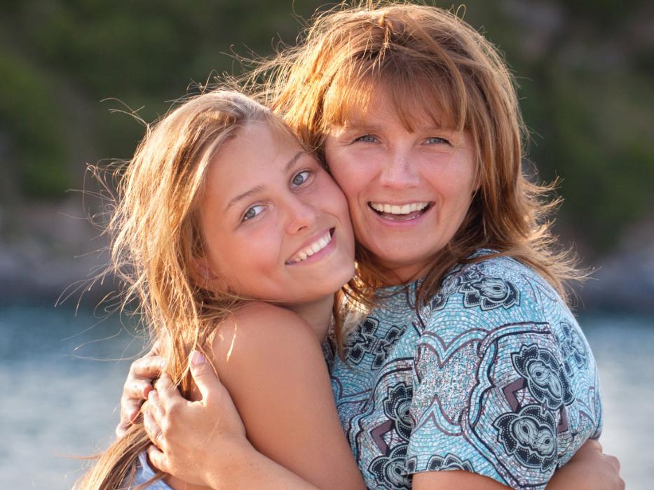 mother and daughter hugging